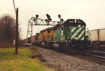 Loaded coal train rolls east